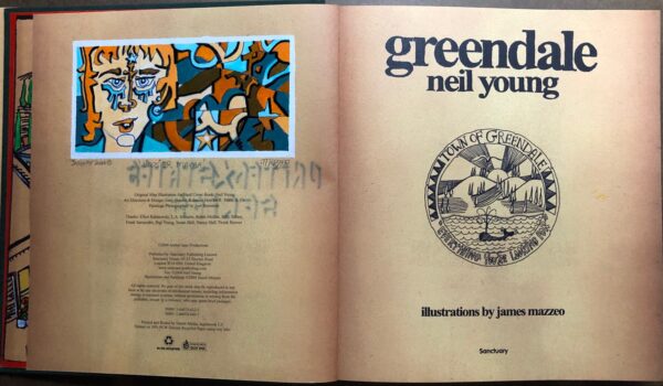 A book opened to the title page of neil young 's " greends ".
