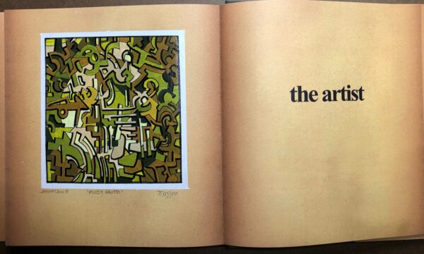 A book with an image of the artist 's work.