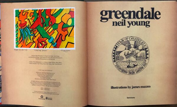 A book opened to the title page of neil young 's " greends ".