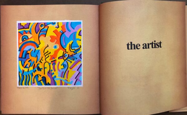 A book with an abstract painting on the cover.