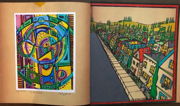 A book with two different paintings of buildings.
