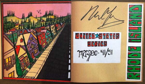 A book with graffiti on the cover and an autograph of a person.