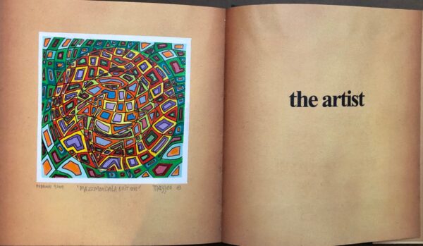 A book with an image of a spiral in the middle.