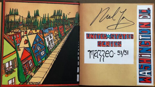 A book with a drawing of houses on it