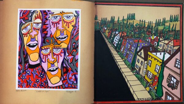 A book with two paintings of faces and buildings.